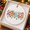 Festive Ceramic Nurse Ornament with Candy Cane & Gingerbread